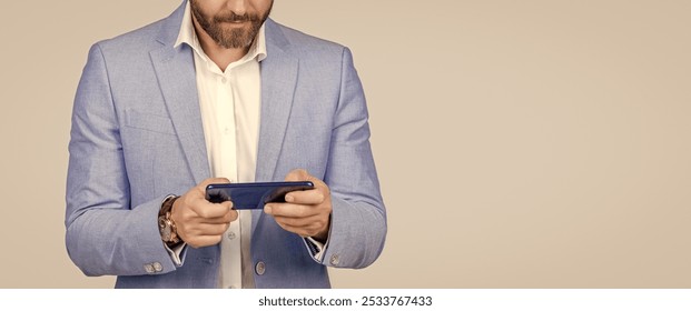 Middle aged hispanic business man with phone. Business communication. Casual business man chatting on phone isolated on grey. Businessman using phone. Man phone conversation in studio. advertisement - Powered by Shutterstock