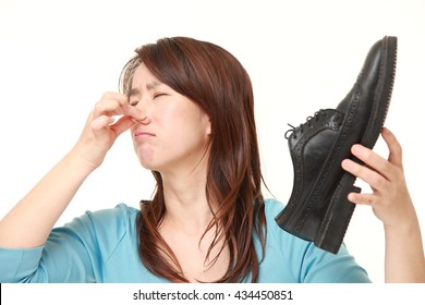 Middle Aged Japanese Woman With Smelly Shoes