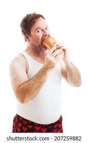 Middle Aged Man In His Underwear, Stuffing His Face With A Giant Hoagie Sandwich.  Isolated On White.  