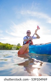 A Middle Aged Man Kayaking