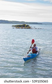 A Middle Aged Man Kayaking