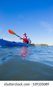 A Middle Aged Man Kayaking