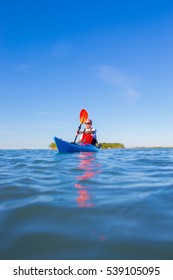 A Middle Aged Man Kayaking