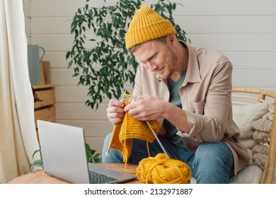 Middle Aged Man Learning Knitting On Needles. Knitting Project In Progress. Man Learning A New Hobby