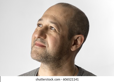 Middle aged man looking up