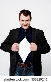 Middle aged man pulling his shirt open