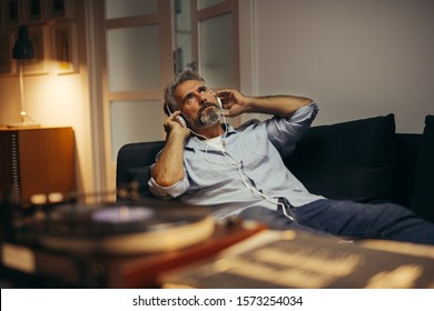 Mid Aged Man Listening Music Headphones Stock Photo (Edit Now) 1503129278