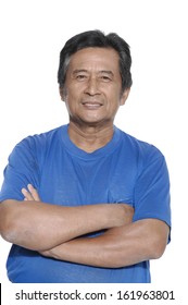 Middle Aged Man standing with folded hands on white background