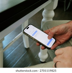 Middle Aged Man Using Artificial Intelligence Mental Health Therapy Bot at Home - AI Therapy and Counseling Concept