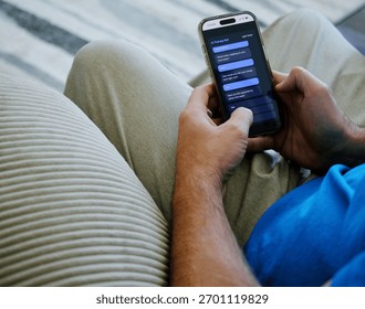 Middle Aged Man Using Artificial Intelligence Mental Health Therapy Bot at Home - AI Therapy and Counseling Concept