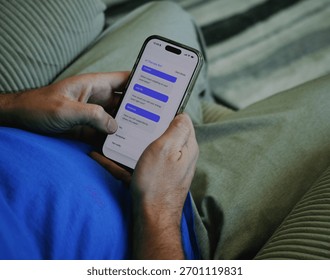 Middle Aged Man Using Artificial Intelligence Mental Health Therapy Bot at Home - AI Therapy and Counseling Concept