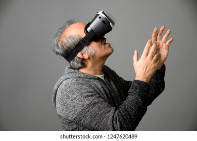 Middle Aged Man Wearing VR Headset