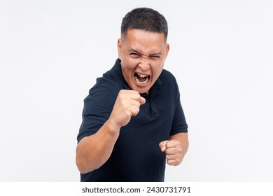 A middle aged man yelling while challenging someone to a fistfight. Studio shot, white background.
