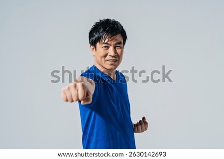 Middle aged men doing boxercise