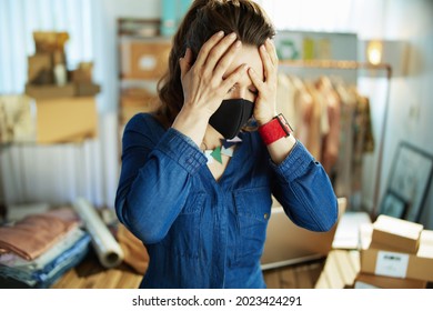 Middle Aged Small Business Owner Woman With Black Mask In The Office.