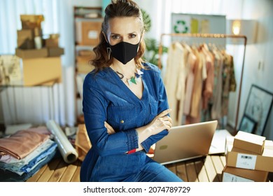 Middle Aged Small Business Owner Woman With Black Mask In The Office.