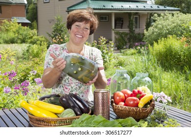 Middle Aged Woman Making Home Made Pickles 