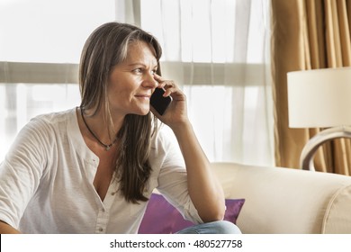 Middle Aged Woman On A Phone