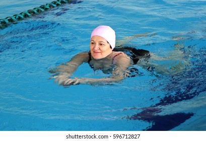 Middle Aged Woman In A Swimming Pool