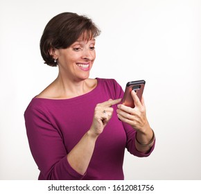 Middle Aged Woman Taking A Selfie. Gen X Social Media Concept Image