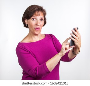 Middle Aged Woman Taking A Selfie. Gen X Social Media Concept Image