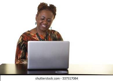 Middle Aged Woman Using A Computer