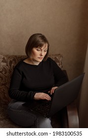 Middle Aged Woman Working From Home, Laptop And Adult Businesswoman, Copy Space, Negative Space, Mock Up 