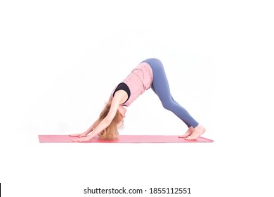 middle aged woman yoga asanas. instructor shows a pose from yoga isolated on a white background. woman practicing yoga concept natural balance between body and mental development.