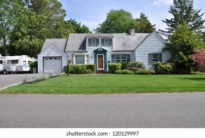 Middle Class Suburban Cape Cod Style Home Front Yard