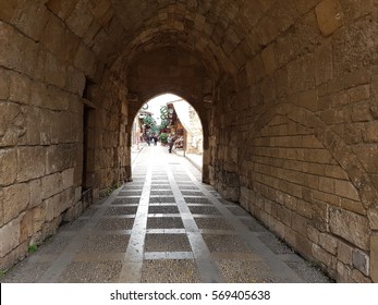 Middle East Lebanon Byblos market stone arch and square paving leading to the market itself.  - Shutterstock ID 569405638