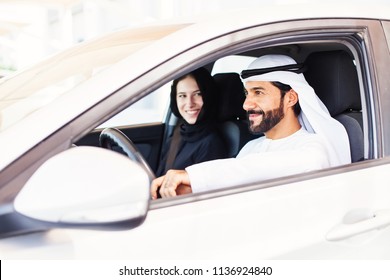 Middle Eastern Arab Couple Traveling In Car, Man Driving