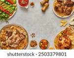 Middle Eastern or Arabic cuisine with a variety of mezze on a rustic concrete backdrop Food that is Halal. Cuisine from Lebanon, Turkey, and Egypt, with mixed veggies and a gorgeous table top view
