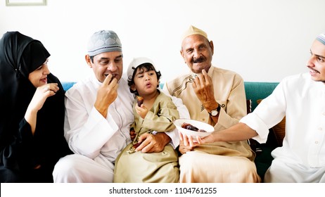 Middle Eastern Family Eating Dates Together