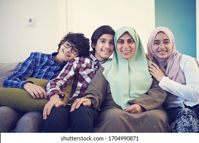 Middle Eastern Family Portrait Single Mother With Teenage Kids At Home In Living Room