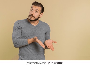 Middle eastern man raising hands asking what why reason of failure disbelief irritation by troubles, trendy social media meme anti lifehacks, ridicules people who complicate simple tasks for no reason
