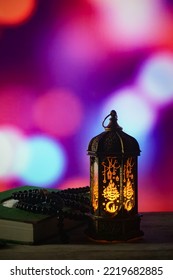 Middle Eastern Style Lantern With Golden Light On Blurred Background Of Colorful Lights