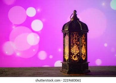 Middle Eastern Style Lantern With Golden Light On Blurred Background Of Colorful Lights