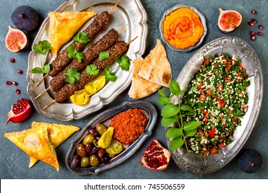 Middle Eastern traditional dinner. Authentic arab cuisine. Meze party food. Top view, flat lay, overhead 