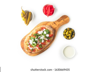 Middle Eastern, Vegetarian And Vegan Cuisine. Including Falafel, Hummus, Baba Ganoush, Fatteh, Pitta, Feta Sald, Moutabal, Tahini, Tabbouleh, Ful Medammes, Many Vegetables On White Background Isolated