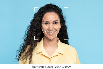 A middle eastern woman with curly hair smiles while a facial recognition overlay appears on her face against a blue background.