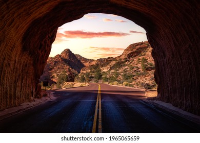 Middle of the road from tunnel view of a scenic route in American Canyons Mountain Landscape. Sunset Sky Art Render. Taken in Zion National Park, Utah, United States.