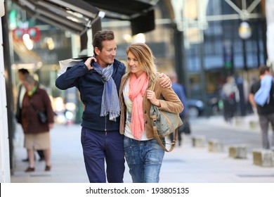 Middle-aged couple doing shopping on week-end - Powered by Shutterstock