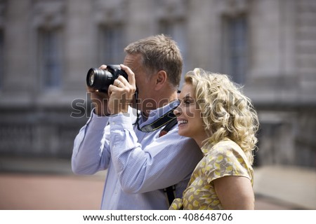 Similar – Image, Stock Photo Happy photographer is taking a photo