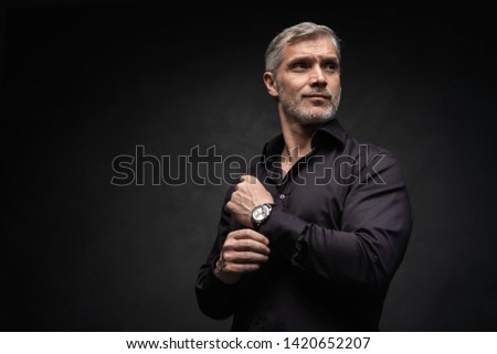 Similar – Image, Stock Photo Happy black good looking male using mobile phone on street