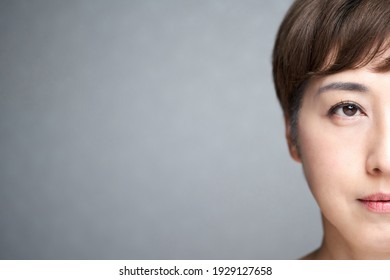 Middle-aged Japanese woman with a serious expression