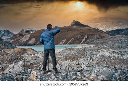 Middle-aged Man Trekking At Gokyo Lakes On The Mount Everest Route In The Himalayas, Nepal.