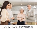 Middle-aged son introduces his girlfriend to elderly parents. Upset parents look disapprovingly at their son and his chosen one.