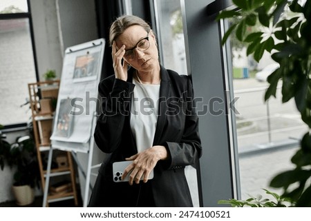 Similar – Image, Stock Photo Frustration in garden office | man sits at table in front of laptop and holds hands in front of face