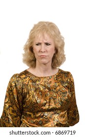 Middle-aged Woman Frowning Over Something Creating A Furrowed Brow