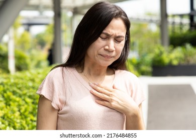 Middle-aged Woman Having Gerd Acid Reflux, Heartburn Inflammation